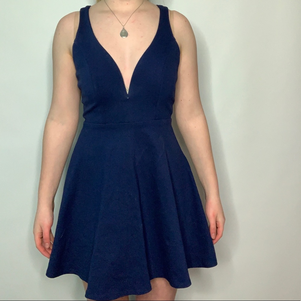 Deep v-neck navy blue homecoming dress